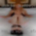 Naked woman standing table